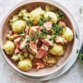 Boiled new potatoes with salmon and dill.