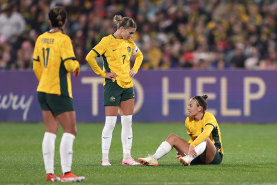 ADELAIDE, AUSTRALIA - MAY 31: Caitlin Foord of Australia reacts after an injury during the international friendly match between Australia Matildas and China PR at Adelaide Oval on May 31, 2024 in Adelaide, Australia. (Photo by Cameron Spencer/Getty Images)