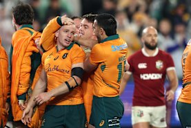 Max Jorgensen of the Wallabies celebrates after scoring