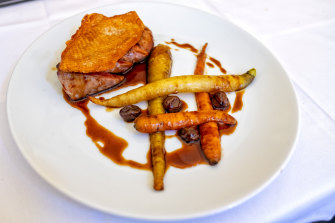 Duck breast with roasted carrots and a grappa jus at Becco.
