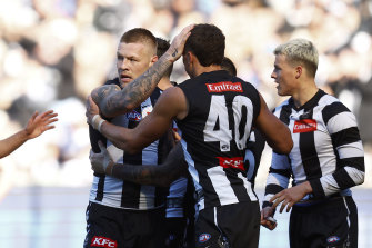 Jordan De Goey celebrates a goal with Ash Johnson.