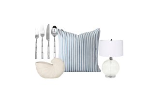 “Shell” sculpture; “Bamboo” five-piece cutlery set; “Taylor” cushion; “Ravella” lamp.