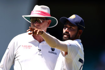 India’s Mohammed Siraj stops play during last season’s SCG Test to make a complaint to umpire Paul Reiffel about spectators.