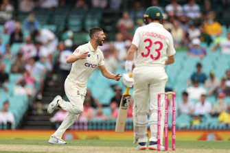 Mark Wood takes Marnus Labuschagne’s wicket on day one in Sydney. 