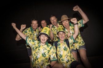 The Buckley crew prepare to cheer for Australia on Boxing Day at the MCG. Adrian Buckley and Karen Buckley top left with Jacob Buckley bottom left.