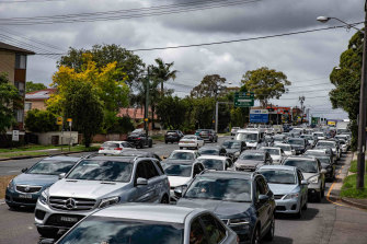The queue for PCR tests at Roselands Shopping Center's open-air parking this week. 