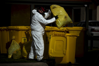 Hazadous waste is removed during a deep clean of  St Basil's Aged Care in Fawkner. 