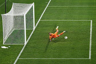 Acton makes a save against Western United.