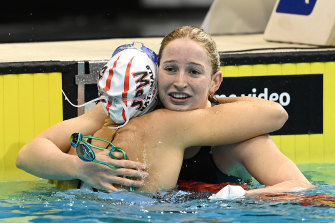Mollie O’Callaghan is congratulated by Shayna Jack after winning the 100m freestyle final in Adelaide.