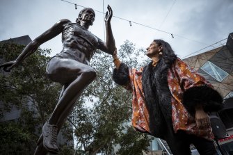 Nova Peris unveils the statue of her at Federation Square in July.