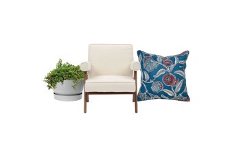 “Greenville” self-watering pot, $44; “Artie” armchair, $1890; “Youngiana” cushion cover, $129.