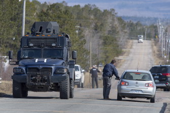 Police block the highway in Debert, Nova Scotia during the mass shooting.