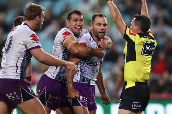 Cameron Smith celebrates during the Storm's 26-20 grand final win over Penrith.