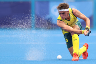 The Kookaburras’ Tim Howard makes a pass against Spain.