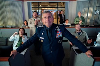 Steve Carell, centre, was earning $US1 million per episode for the just-cancelled Space Force. 