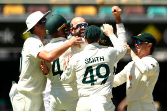 Lyon celebrates after dismissing Dawid Malan for his 400th Test wicket.