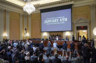 Committee members enter the hearing room as the House select committee investigating the January 6 attack on the US Capitol continues to reveal its findings of a year-long investigation on Friday.