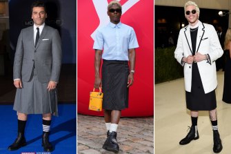 Oscar Isaacs at the Lo<em></em>ndon “Moon Knight” screening in Thom Browne in March; Model Deon Hinton at the Louis Vuitton menswear show in June; Pete Davidson at the Met Gala in Thom Browne in September.
