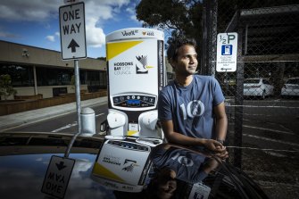 Ajo Pathmanathan at an out-of-order EV charging station in Altona. 