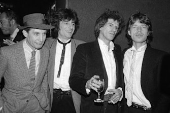 (From left) Charlie Watts, Ron Wood, Keith Richards, and Mick Jagger attend a party in New York to celebrate the opening of their film Letâ€™s Spend The Night Together in 1983.