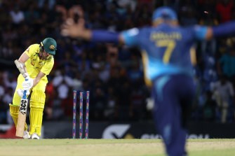 Mitchell Swepson of Australia reacts after he is bowled by Chamika Karunaratne.