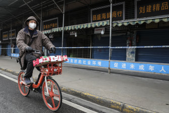 A man wears a mask in Wuhan, China.