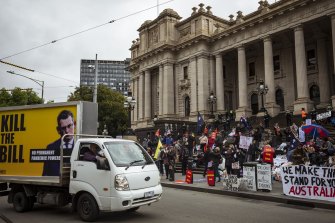 Around 300 protestors remained on  the steps of Parliament House on Tuesday.
