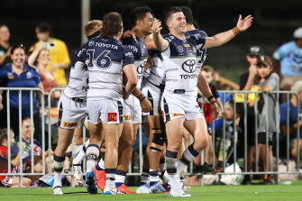 Chad Townsend and the Cowboys celebrate one of their six tries in the 35-4 shellacking of Parramatta last week.