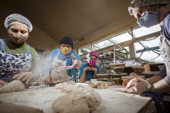 Greg Dee and Tracy Harvey with bakers Sophie Gibson and Thea Ebert at Elwood Sourdough.