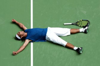 Exhausted and relieved, Rafael Nadal celebrates a win over Russian Mikhail Youzhny at the Australian Open in 2005 in this photo taken by veteran snapper Clive Brunskill.