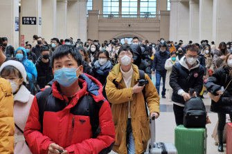 People wait at Hankou Railway Station in Wuhan in China, where the coronavirus outbreak is believed to have originated.