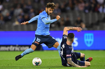 Sydney's Milos Ninkovic scores a goal in the A-League over Melbourne Victory.