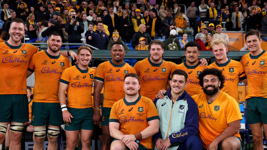 Wallabies pose for a team photo after their victory.