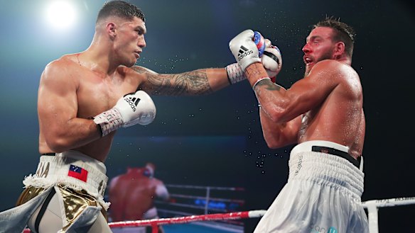 Opetaia connects with a left.