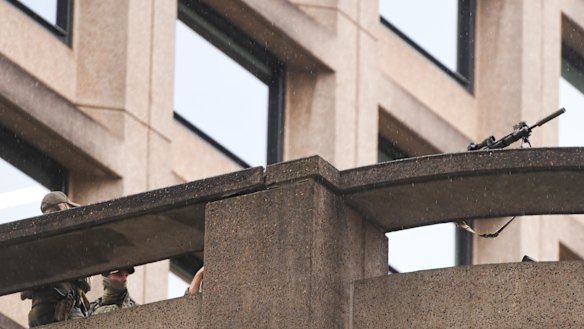 Snipers surround the Israeli president’s delegation.