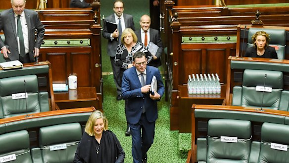 Daniel Andrews arrives for question time with fellow Labor MPs in tow. 