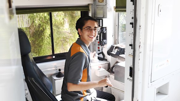 Train driver Thea Pratt prepares to depart Lidcombe station.