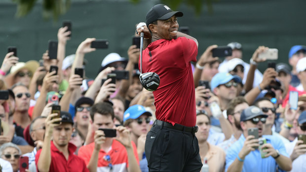 Finally: All eyes were on Tiger Woods as he finally ended his title drought.