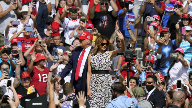 Donald and Melania Trump at a campaign rally in Florida on Thursday.