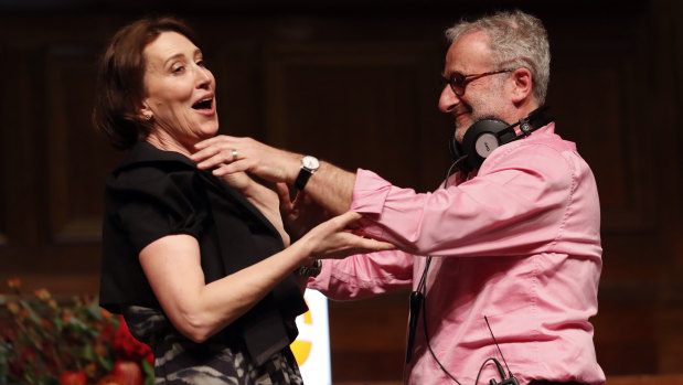 Outgoing radio host Jon Faine with Virginia Trioli at his last show at the Melbourne Town Hall.
