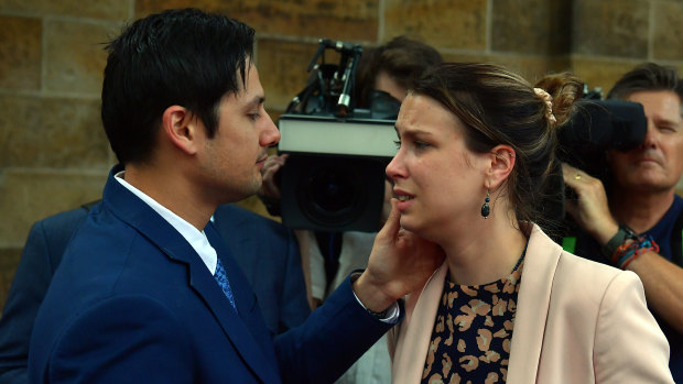 A distraught Blake Davis and Hannah Quinn outside the Darlinghurst Supreme Court after the jury delivered its verdicts.