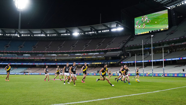 The sound and the fury: Richmond and Carlton in action at an empty MCG.