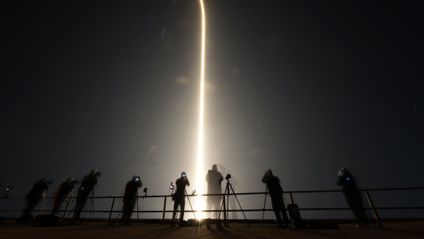 A SpaceX Falcon 9 rocket lifts off in this time-exposure photo, from Launch Pad.