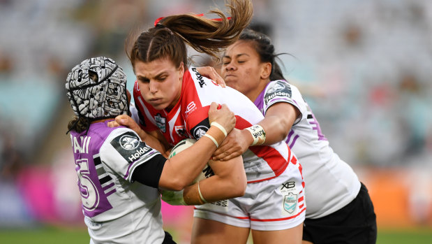 Impressive performance: Jessica Sergis tries to power over the Warriors defence.