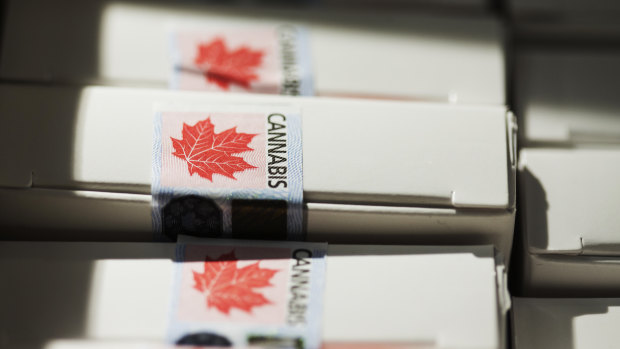 Boxes of pre-rolled joints sit stacked at a Quebec Cannabis Society (SQDC) store during a media preview event in Montreal, Quebec, Canada.