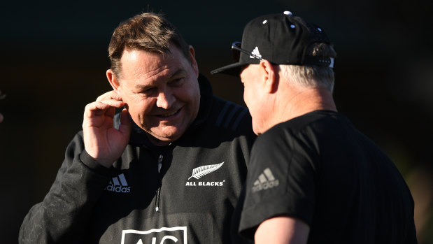 Steadfast: New Zealand coach Steve Hansen's backroom staff sit in start contrast to Jones' England.