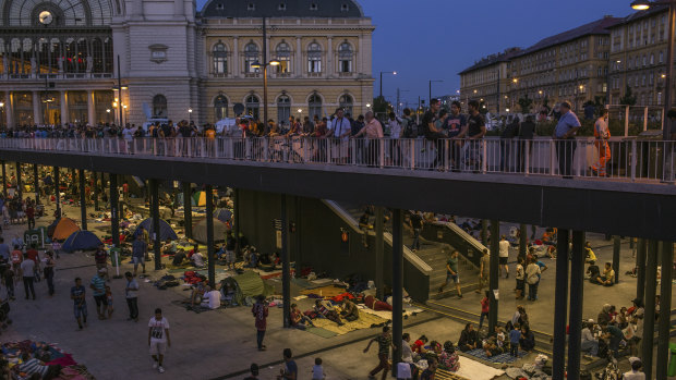 Syrian refugees camped out at Keleti station, Budapest, in 2015, waiting to travel to Germany.  The number of migrants arriving in 2018 is down to pre-crisis level.