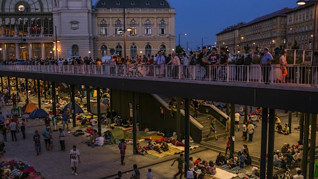 Syrian refugees camped out at Keleti station, Budapest, in 2015, waiting to travel to Germany.  The number of migrants arriving in 2018 is down to pre-crisis level.