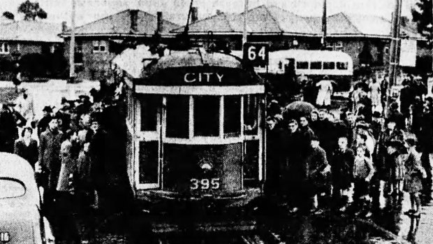 Crowds gathered at East Brighton tram terminus at 7.30 a.m. waiting their chance to board a city-bound car. 