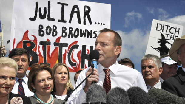 Then opposition leader Tony Abbott addresses the crowd during a demonstration against the Australian Labor government's proposed carbon tax in 2011.